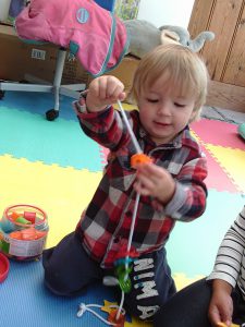 A Portfield Farm Nursery & Forest School child playing in the preschool